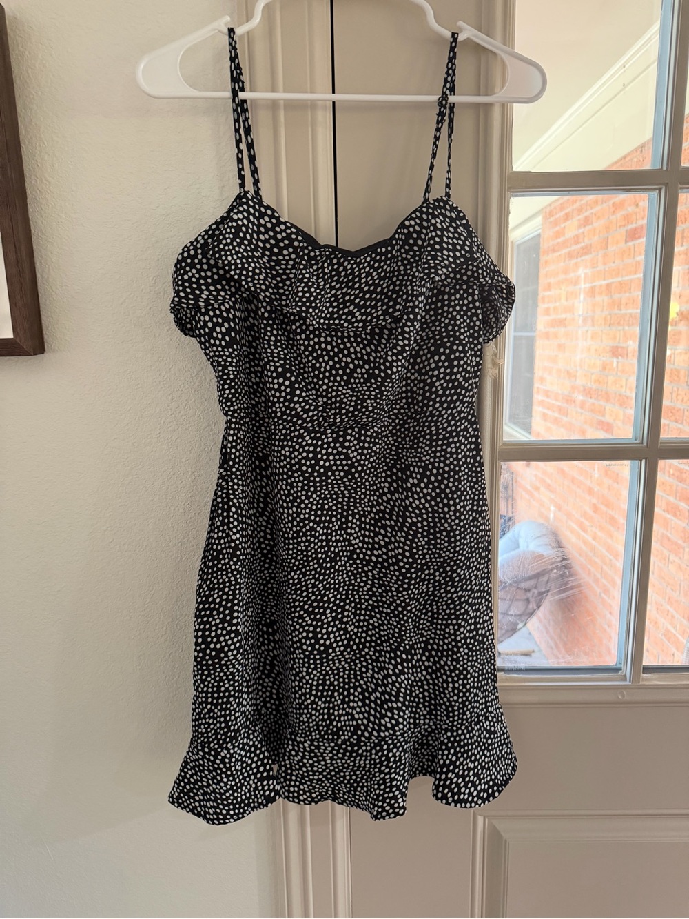 Black and White Polka Dot Mini Dress with Ruffle Neckline